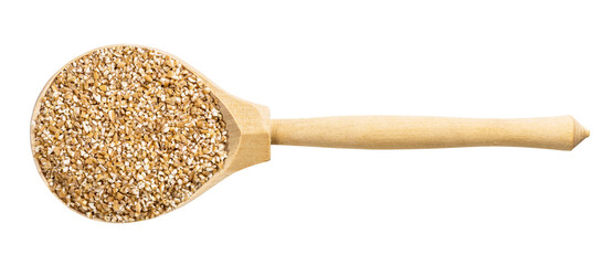 top view of wood spoon with uncooked wheat groats
