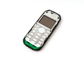 Old and outdated body mobile phone isolated on white background.