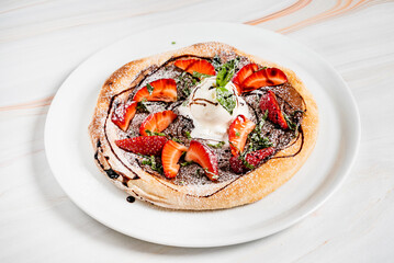 strawberry pizza with chocolate and ice cream