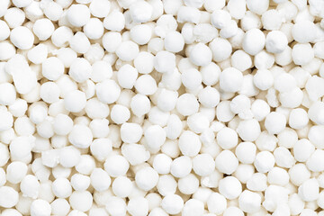 background - many dry sabudana (tapioca sago)