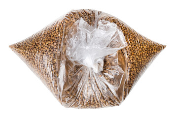 raw buckwheat grains in knotted plastic bag