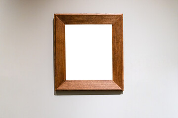 flat wide vertical wooden picture frame on wall