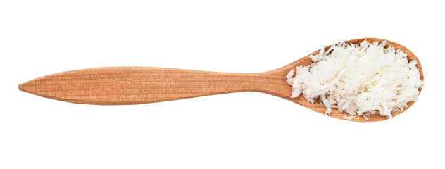 top view of coconut flakes in wood spoon isolated