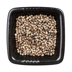 monk's pepper (vitex) in black bowl isolated