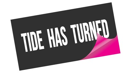 TIDE  HAS  TURNED text on black pink sticker stamp.