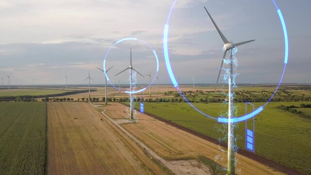 Aerial view of wind turbine generators in field producing clean ecological electricity. Digital effect of futuristic technology.