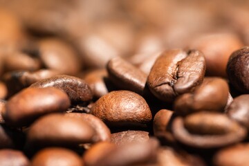 Pile of roasted coffee beans closeup photo