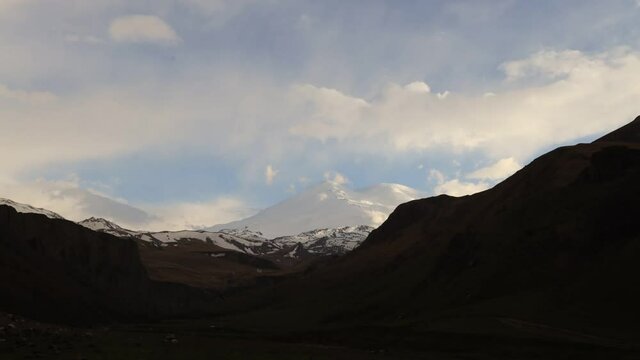 Timelapse 4k, Full HD, Elbrus And Green Hills with road. Dzhili-Su, Republic of Kabardino-Balkaria, North Caucasus, Russia.