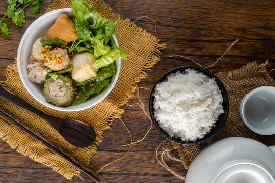 Yong tau foo , yong tau fu or Liong Tahu (In Indonesia). is a Hakka Chinese cuisine consisting primarily of tofu filled with ground meat mixture or fish paste.