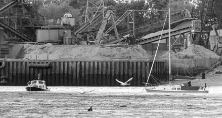 Monochrome image of toil and pleasure