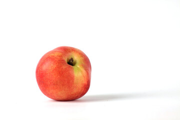 healthy eating concept - nectarine isolated on white background