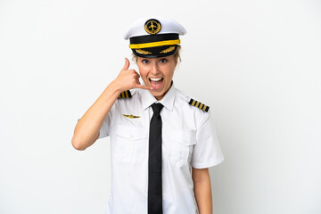 Airplane blonde woman pilot isolated on white background making phone gesture. Call me back sign