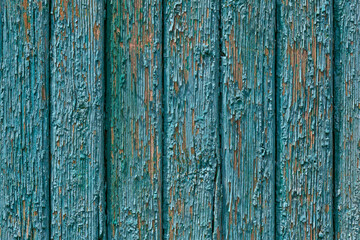 Fototapeta na wymiar detail of blue decrepit wooden wall