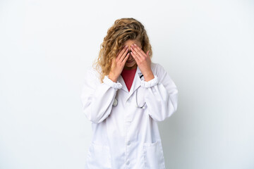 Young doctor blonde woman isolated on white background with tired and sick expression