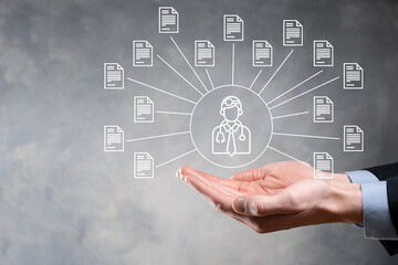 Document Management System DMS .Businessman hold doctor and document icon.Software for archiving, searching and managing corporate files and information.Internet Technology Concept.Digital security.