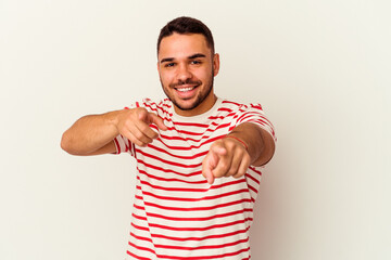 Young caucasian man isolated on white background cheerful smiles pointing to front.