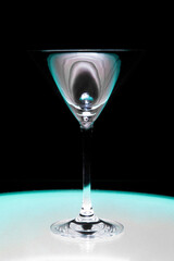 blue glass marbles with wine glass on the table