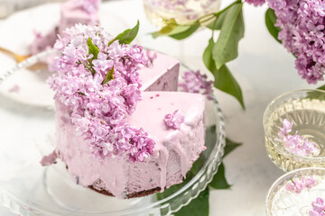 berry mousse cake. Homemade fraisier cake with purple blooming lilac, banner, menu, recipe