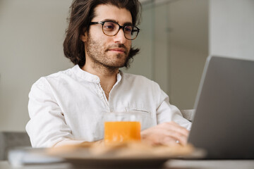 Smiling mid aged brunette turkish man
