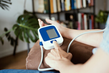 measuring blood pressure with a sphygmomanometer