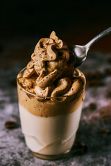 takes a spoon of dalgona coffee