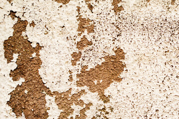 White and beige dirty wall plaster background texture. Decorative paint for walls