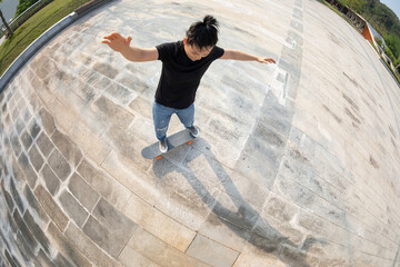 Skateboarder skateboarding outdoors in the morning