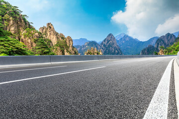 Mountain road natural landscape on a sunny day.