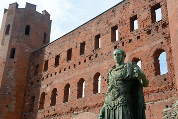  the statue of Julius Caesar in front of the Porta Palatina which was the Porta Principalis Dextera of Augusta Taurinorum, or the Roman civitas now known as Turin.