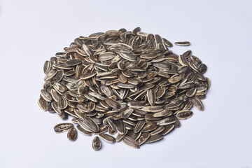 heap of sunflower seeds isolated on white