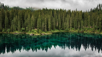 Fototapeta na wymiar Carezza lake in the Italian Dolomites