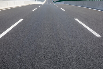 Straight asphalt road pavement scene. © ABCDstock