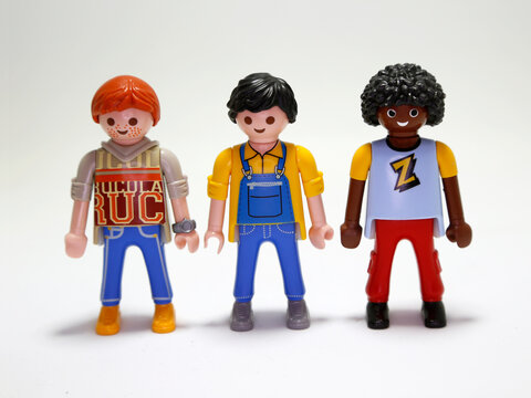 Playmobil collectible dolls. Different models of men. Male figures. Plastic  toys for boys and girls. Young boys. Redhead, brunette, afro american.  Friends, group. Isolated white. Stock Photo | Adobe Stock
