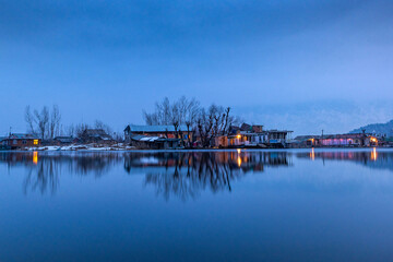 Fototapeta premium A view of Dal Lake in winter at evening, Srinagar, Kashmir, India.