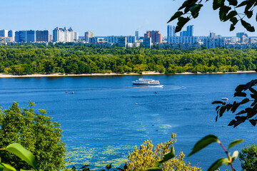 Naklejka premium View on a river Dnieper and residential districts in Kiev, Ukraine