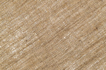 simple linen background: the reverse side of the primed canvas stretched over the frame, close, toning