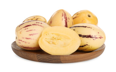 Plate with fresh ripe pepino melons on white background