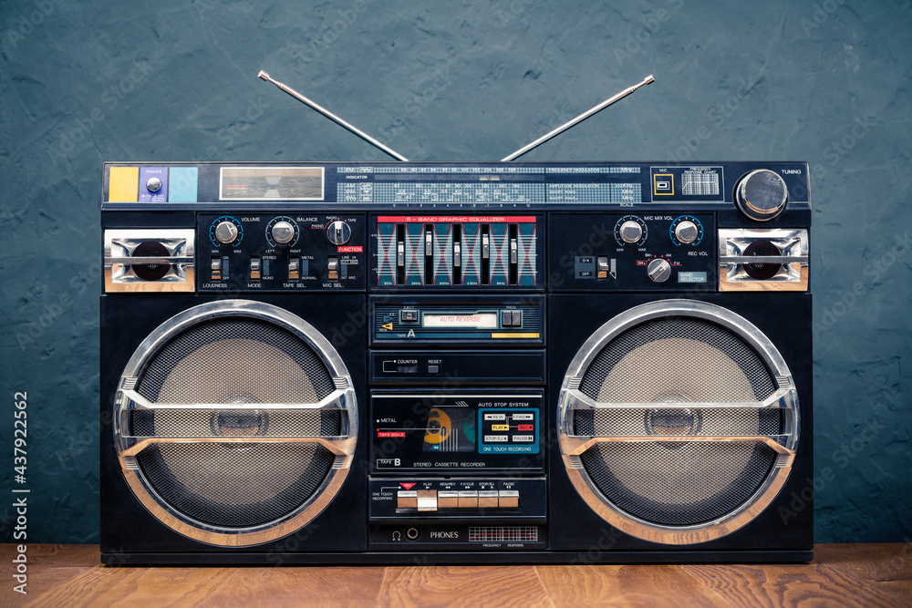 Wall mural retro boombox ghetto blaster outdated portable black radio receiver with cassette recorder from 80s 