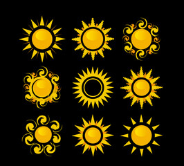 Set of suns on a black background. Vector