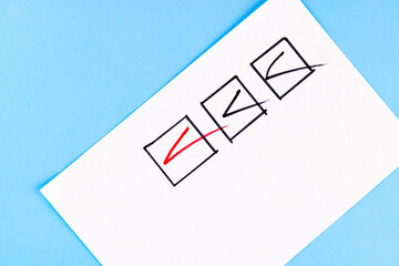 Red marking on checklist box with pen, Checklist concept