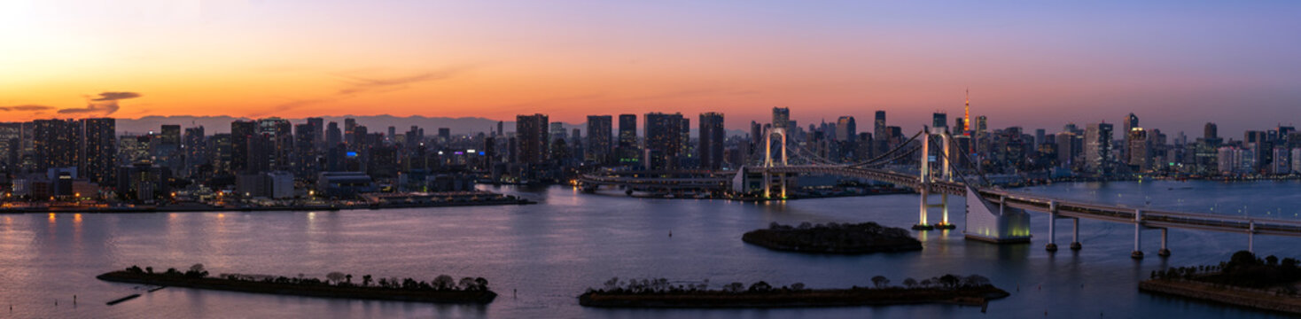 Ultra Wide panorama image of beautiful sunset with skyscrapers at Tokyo, Japan.