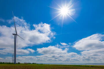 wind generator on a bright sunny day by the sea
