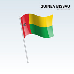 Guinea waving flag isolated on gray background