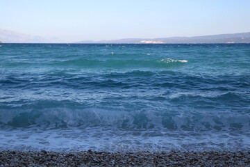 Waves on a beach in Croatia. Selective focus.