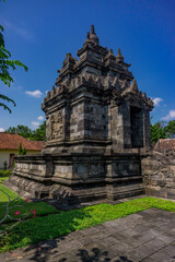Fototapeta na wymiar Pawon Temple and its reliefs in Magelang, Central Java, Indonesia