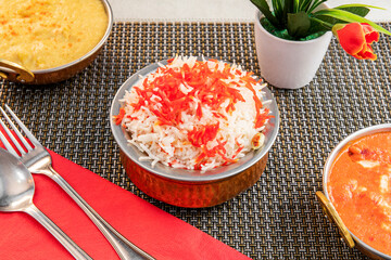 Typical Pakistani restaurant metal bowl with pilau rice
