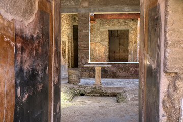 Fototapeta na wymiar Archaeological Park of Pompeii. House of Fabius Amandius. Campania, Italy