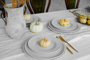 pumpkin cakes on the white plates for breakfast