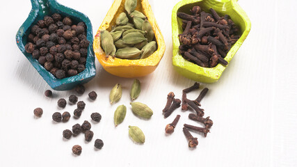 Group of Organic Black pepper isolated on white background. Selective focus and Top view (Flat Lay)