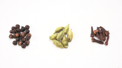 Group of Organic Black pepper isolated on white background. Selective focus and Top view (Flat Lay)
